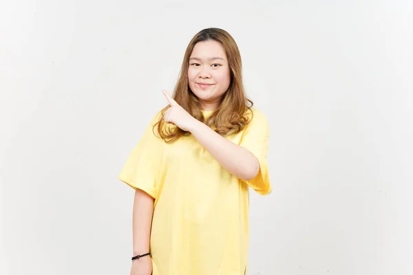 Showing Product Pointing Side Beautiful Asian Woman Wearing Yellow Shirt — Photo