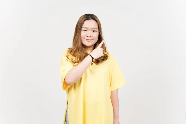 Showing Product Pointing Side Beautiful Asian Woman Wearing Yellow Shirt — Stock Photo, Image