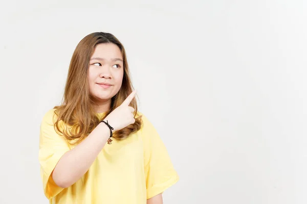 Showing Product Pointing Side Beautiful Asian Woman Wearing Yellow Shirt — Stockfoto