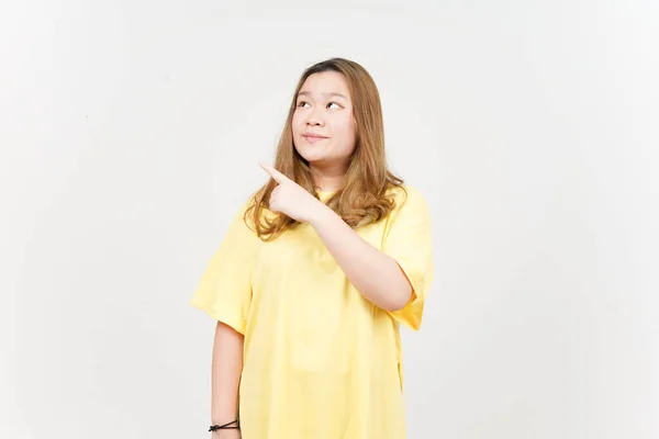 Showing Product Pointing Side Beautiful Asian Woman Wearing Yellow Shirt — Stock Fotó