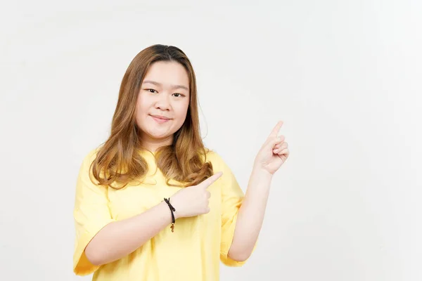 Showing Product Pointing Side Beautiful Asian Woman Wearing Yellow Shirt — Fotografia de Stock