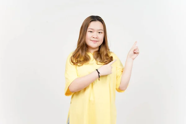 Showing Product Pointing Side Beautiful Asian Woman Wearing Yellow Shirt — 图库照片