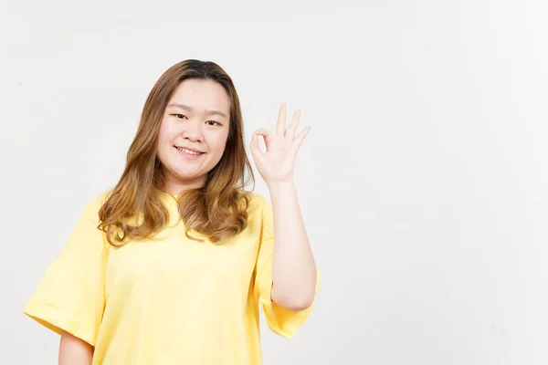 Showing Sign Beautiful Asian Woman Wearing Yellow Shirt Isolated White — Stock Photo, Image