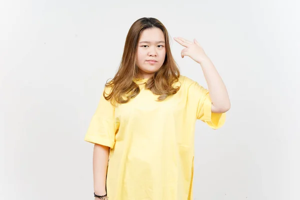 Gun Finger Head Beautiful Asian Woman Wearing Yellow Shirt Isolated — Stockfoto