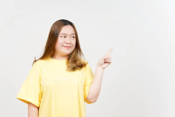 Showing Product Pointing Side Beautiful Asian Woman Wearing Yellow Shirt — 스톡 사진