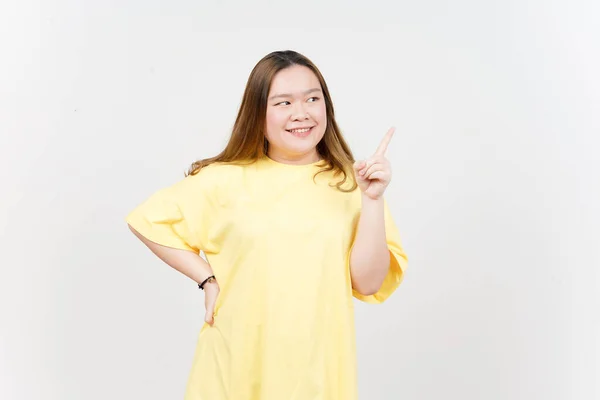 Showing Product Pointing Side Beautiful Asian Woman Wearing Yellow Shirt — Stockfoto