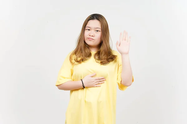 Swearing Gesture Beautiful Asian Woman Wearing Yellow Shirt Isolated White — стоковое фото