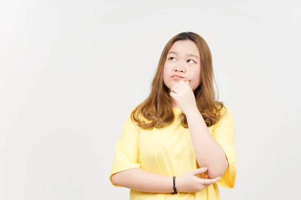 Thinking Gesture Beautiful Asian Woman Wearing Yellow Shirt Isolated White — Fotografia de Stock