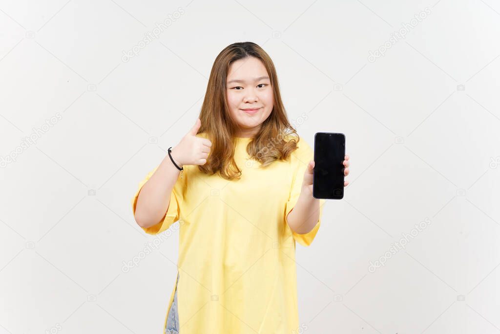 Showing Apps or Ads On Blank Screen Smartphone of Beautiful Asian Woman wearing yellow T-Shirt