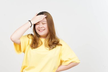 Forget Something Gesture of Beautiful Asian Woman wearing yellow T-Shirt Isolated On White