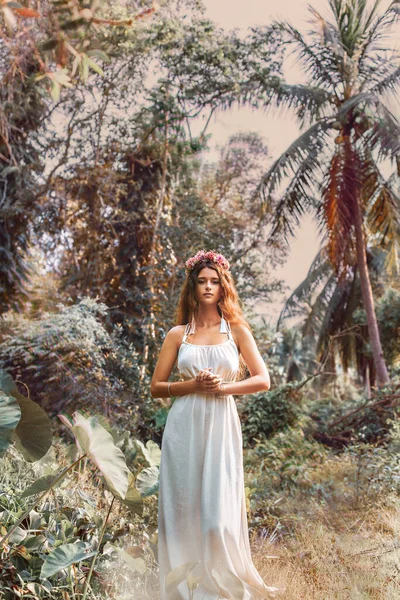 Sensual boho woman in white dress outdoors Stock Photo by