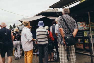 Ukraine, Odessa - August 3, 2003. The queue of buyers at the food market.
