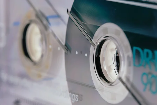 Audio compact cassette supply reels closeup. Macro. Selective focus.
