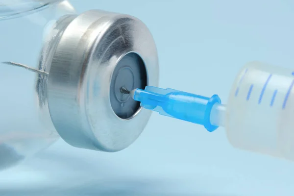 Taking Medication Syringe Injection Closeup Macro Blue Background — Zdjęcie stockowe