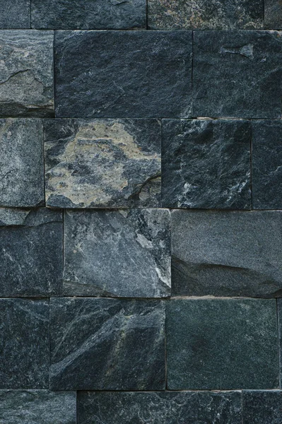 Square granite tiles, close-up. Texture, background for design.