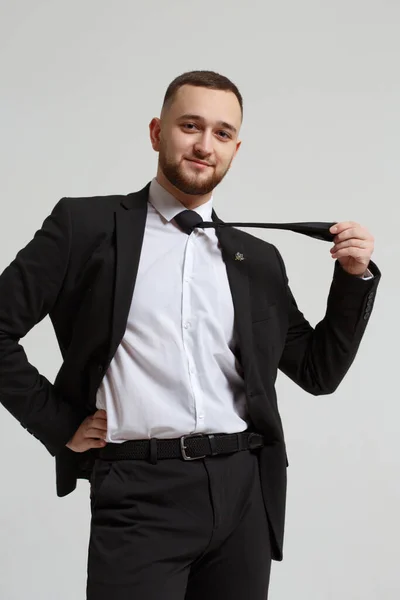 Cheerful Young Man Beard Business Suit Holds Tie River Isolated — Stock Photo, Image