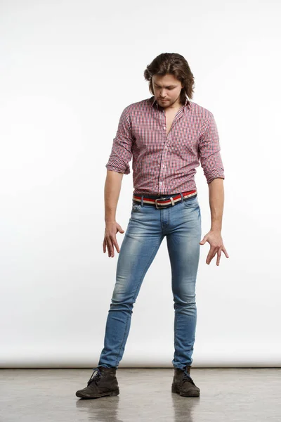 Nice Guy Long Hair Jeans Stands Studio Full Growth — Fotografia de Stock