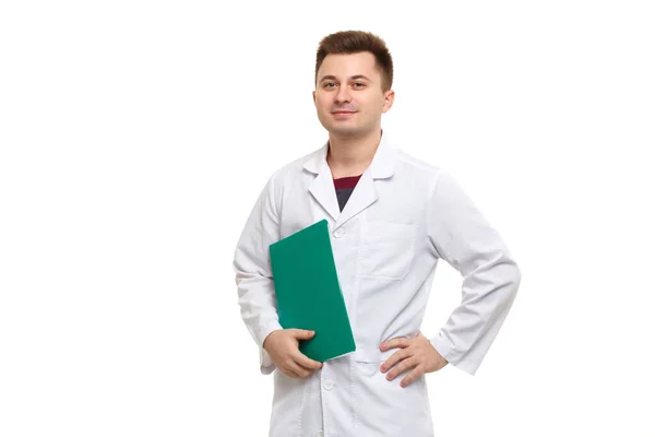 Young Handsome Doctor White Coat Holding Green Folder Isolated White — Foto de Stock