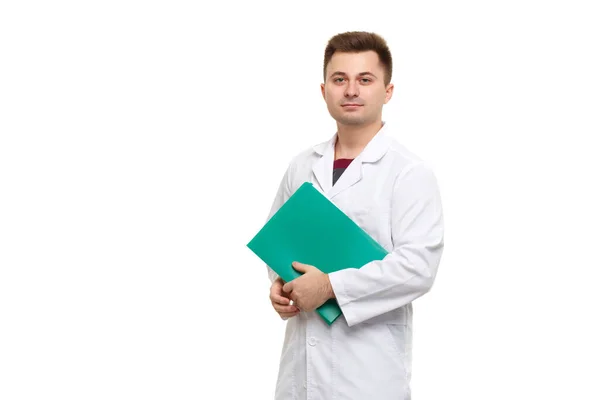 Young Handsome Doctor White Coat Holding Green Folder Isolated White — стоковое фото