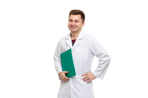 Young Handsome Doctor White Coat Holding Green Folder Isolated White — Stock fotografie