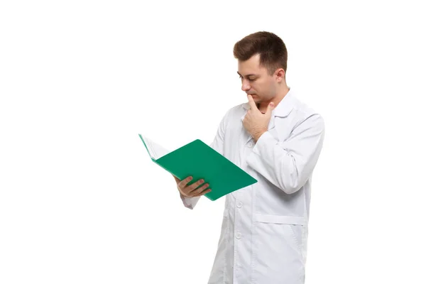 Young Handsome Doctor White Coat Thought Looking Contents Green Folder — Foto de Stock