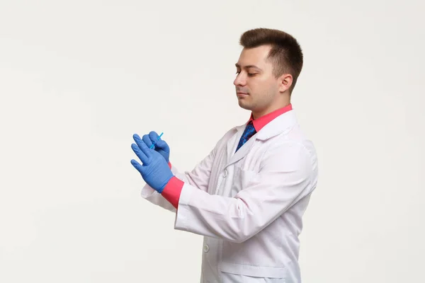 Male Laboratory Assistant White Coat Gloves Holds Slide Test Isolated — Stock fotografie