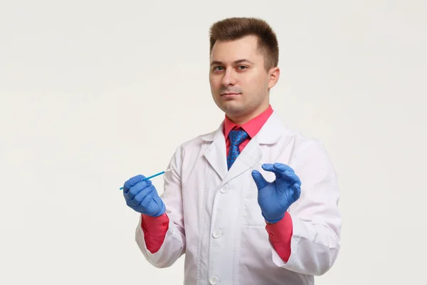 Male Laboratory Assistant White Coat Gloves Holds Slide Test Isolated — Fotografia de Stock