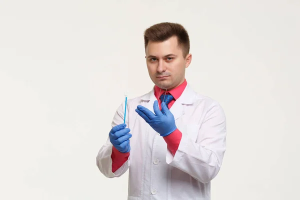 Male Laboratory Assistant White Coat Gloves Holds Slide Test Isolated — Stockfoto