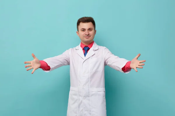 Young Male Doctor White Medical Gown Spread His Hands Welcome — стоковое фото