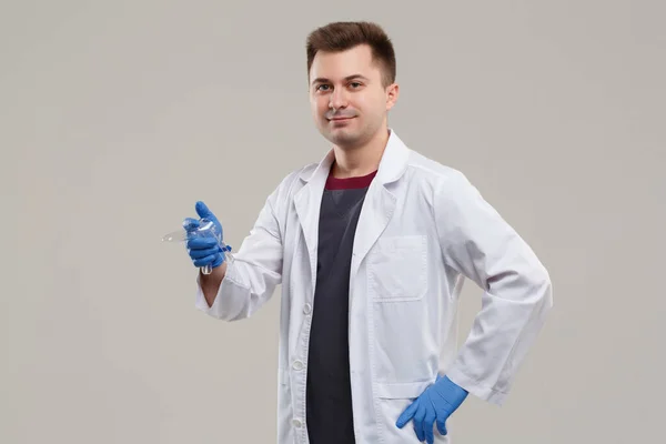 Doctor Gynecologist White Coat Holds Transparent Plastic Gynecological Dilator Isolated — Stock fotografie