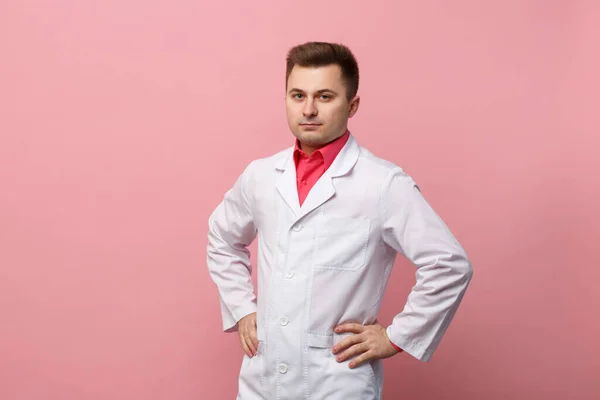 Young Serious Doctor White Coat Pink Background — Stock Photo, Image