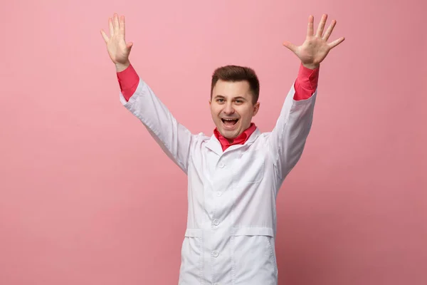 Young Jubilant Doctor White Coat Pink Background — Stock Photo, Image