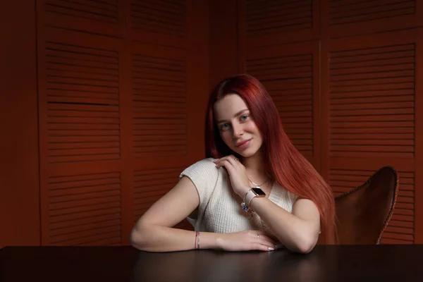 Stylish Long Haired Girl Casual Clothes Sitting Office Table Dark — Fotografia de Stock