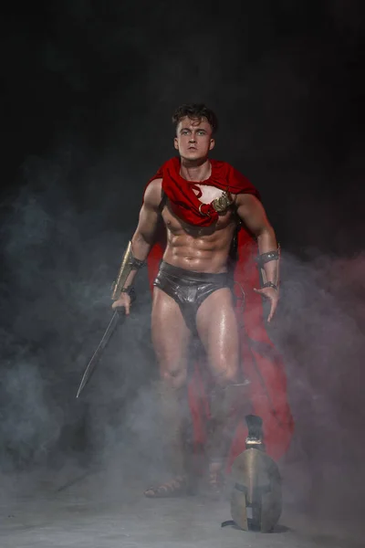 Young Athletic Sexy Man Costume Roman Warrior Red Cloak Black — Photo