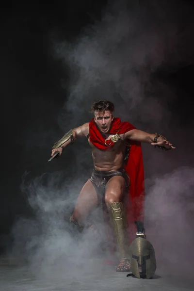 Young Athletic Sexy Man Costume Roman Warrior Red Cloak Move — Stock Photo, Image