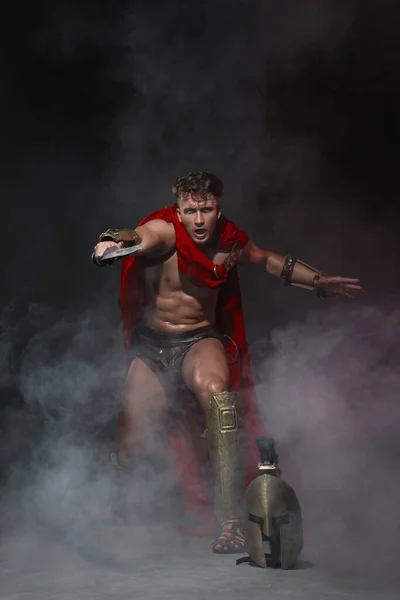 Young Athletic Sexy Man Costume Roman Warrior Red Cloak Move — Foto Stock