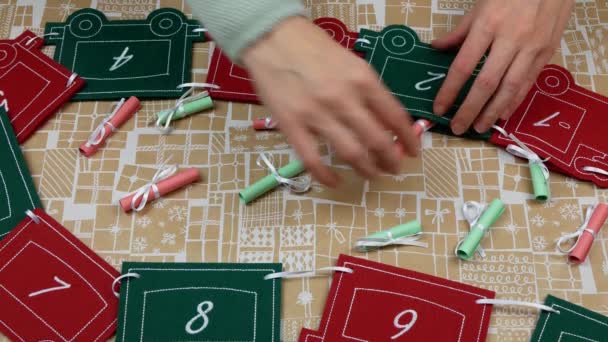 Mother Preparing Personalised Activity Advent Calendar Her Kids Keep Busy — Stock Video
