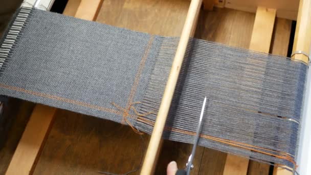 Gray Fabric Cutting Weaving Loom Hand Scissors Cuts Warp Threads — Stock Video