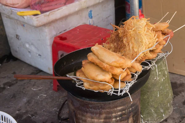 stock image Fried food with sticks on a vietnamese street market. Asia