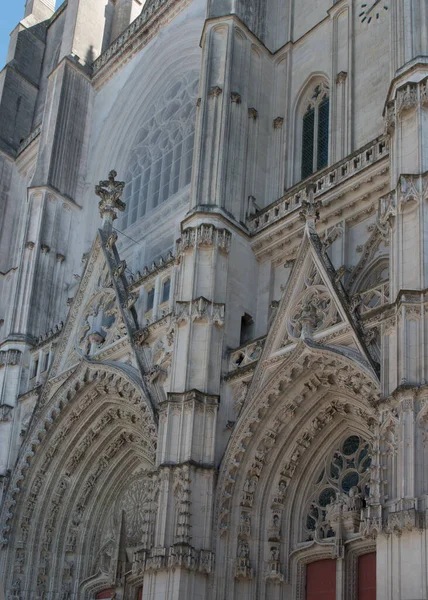 Gothic arches and ornaments. Facade of Nantes cathedral. France