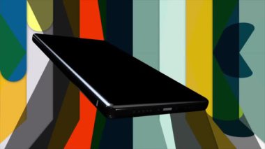 Renkli bir arkaplanda cep telefonu çalkalanıyor