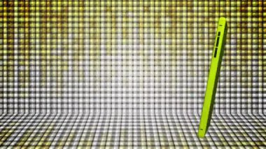 Cep telefonu yeşil ekranlı renkli bir arkaplanda döner.