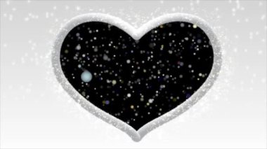 Renkli sisli beyaz kalp ve içinde ışık parlak ve güzel görünüyordu..