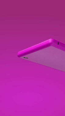 Cep telefonu, sürekli hareket eden parlak neon hatlarının arka planında..