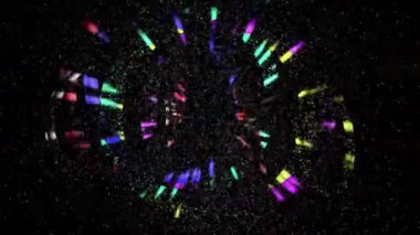 Renkli daireler ve ışıklar siyah bir arkaplanda toplanır..