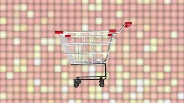 Los Símbolos Del Carrito Compras Giran Continuamente Sobre Fondo Colorido — Vídeos de Stock