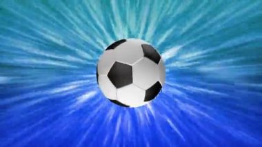 Futbol topunun sembolleri renkli bir arkaplanda dönüyor.