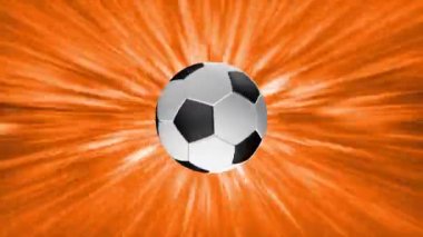 Futbol topunun sembolleri renkli bir arkaplanda dönüyor.
