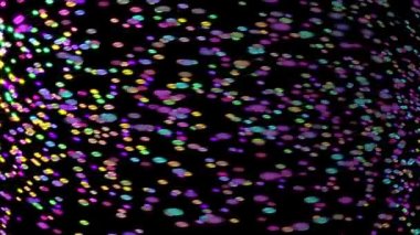 Parlak renkli ovaller uzayda sürekli dönüyorlar..