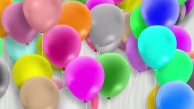 Parlak renkli balonlar sürekli sallanıyordu..